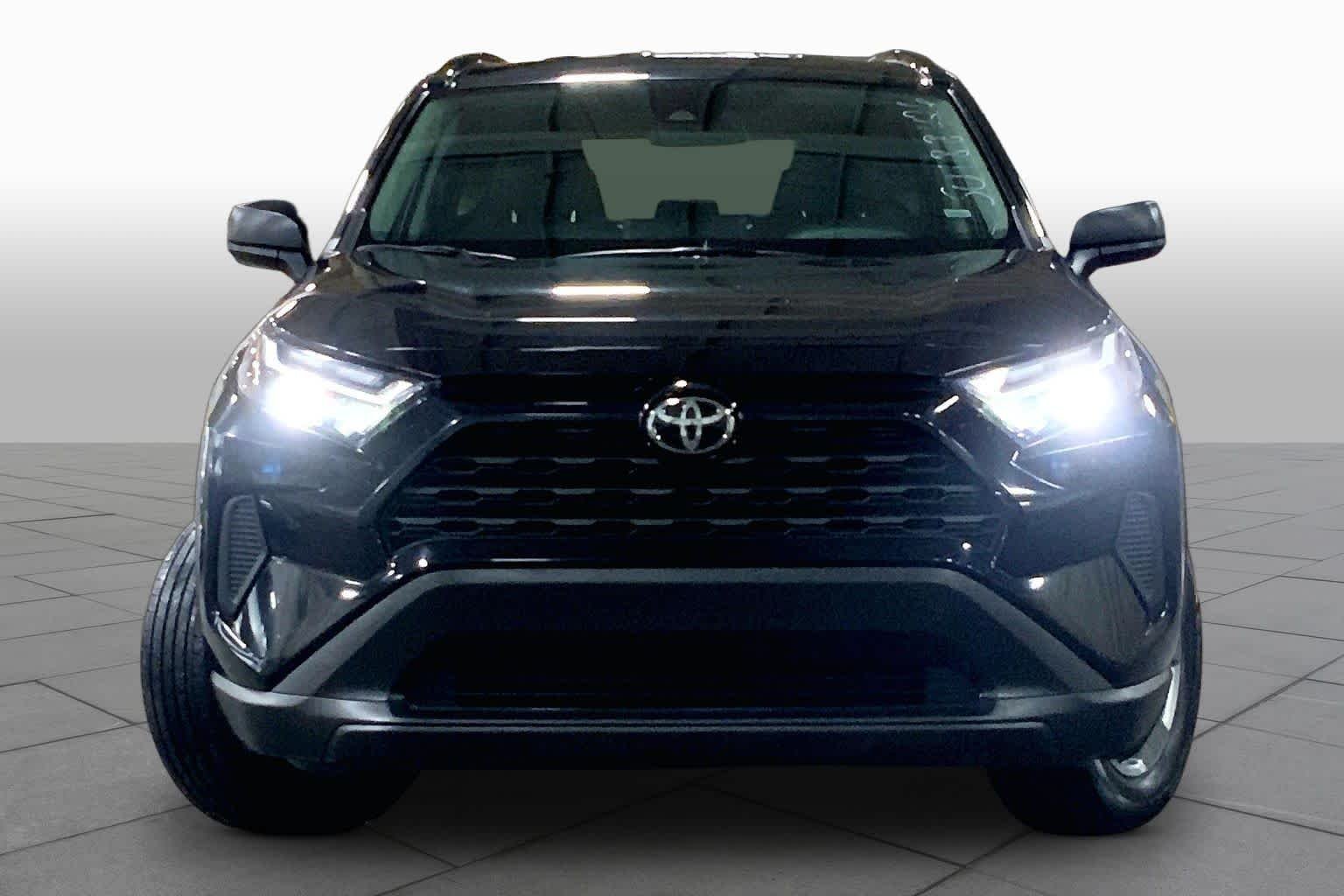 Used 2025 Midnight Black Metallic Toyota Hybrid LE image 4