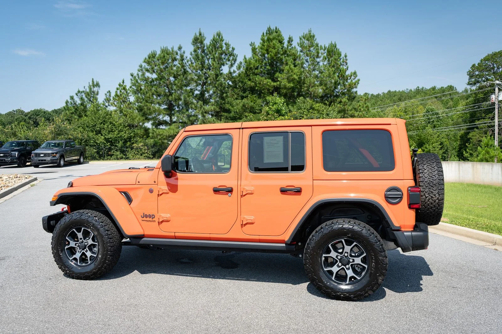 Used 2019 Orange Jeep Unlimited Rubicon image 7
