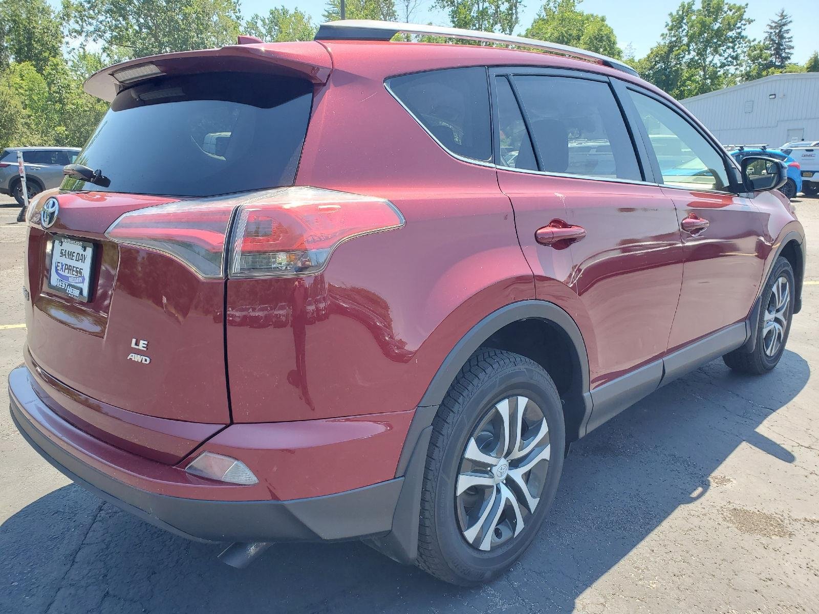 Used 2018 Ruby Flare Pearl Toyota LE image 2