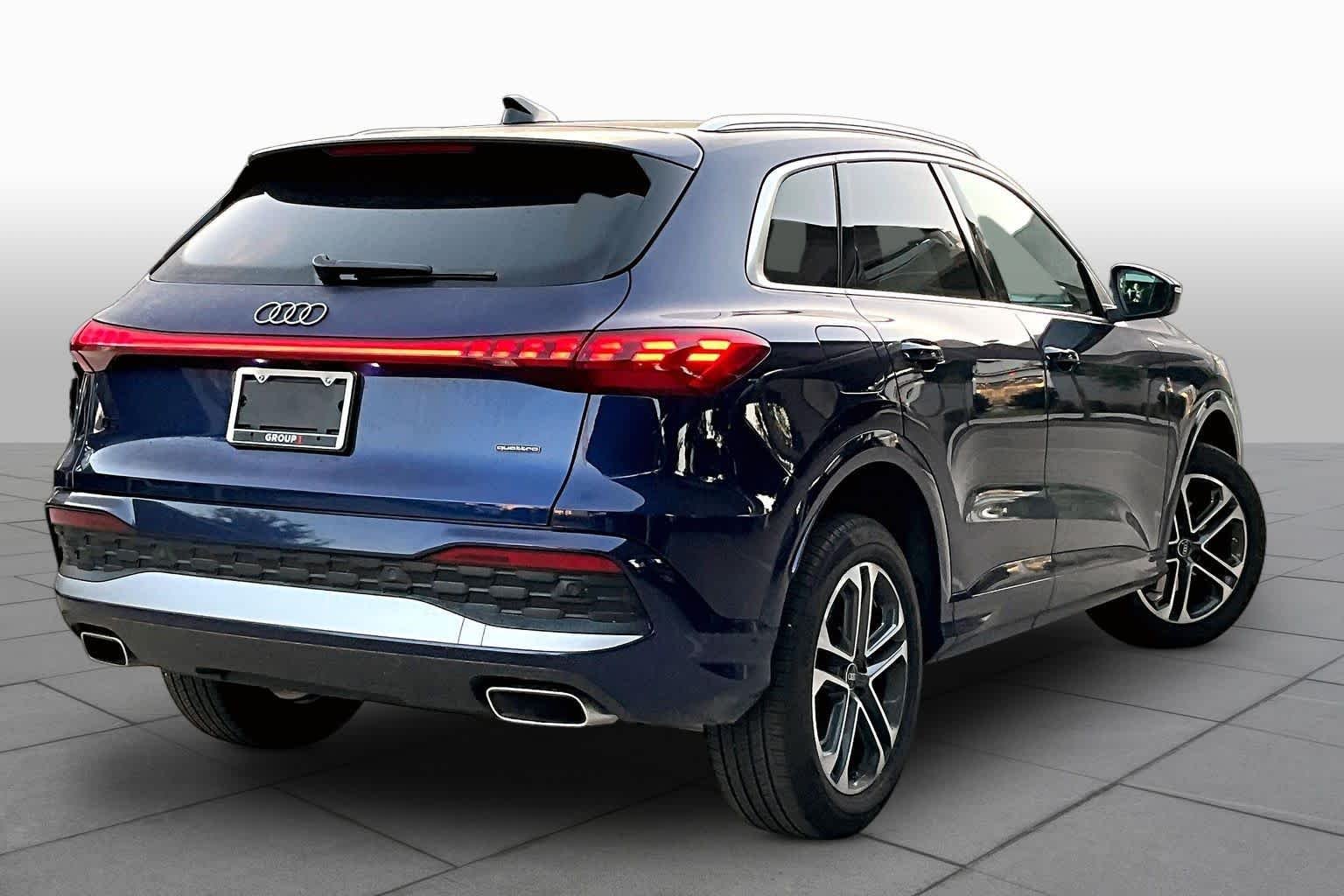 Used 2025 Navarra Blue Metallic Audi Premium image 13