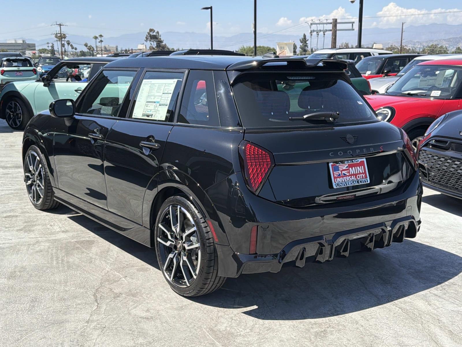 New 2026 0C4R Midnight Black II Metallic MINI Iconic image 4