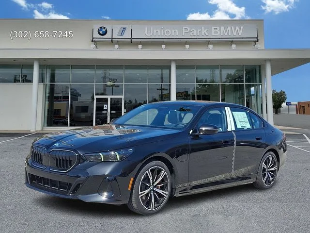 2026 BMW 5 Series 550e xDrive Sedan's photo