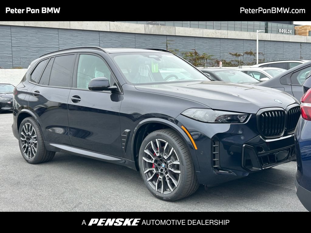 New 2026 Carbon Black Metallic BMW xDrive50e image 1