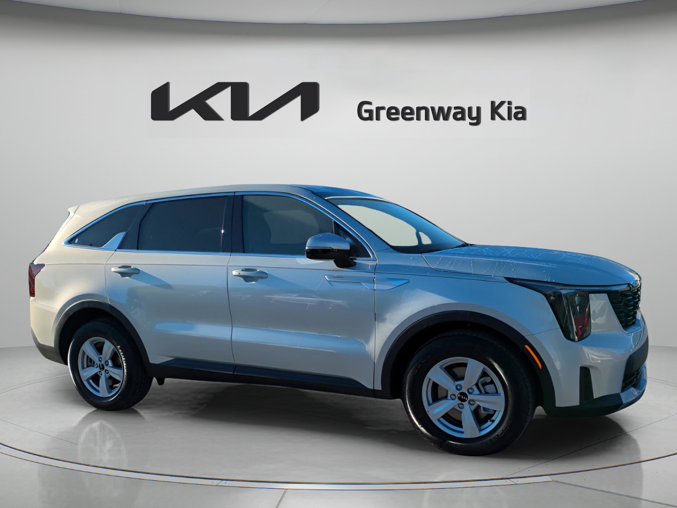 New 2026 Ivory Silver Kia LX image 1