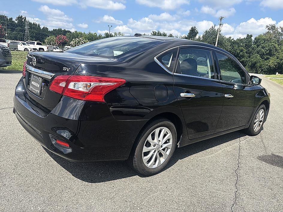 Used 2018 Super Black Nissan SV image 5