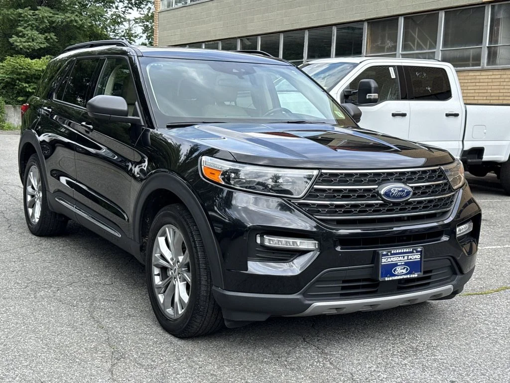 Used 2023 Agate Black Metallic Ford XLT image 1