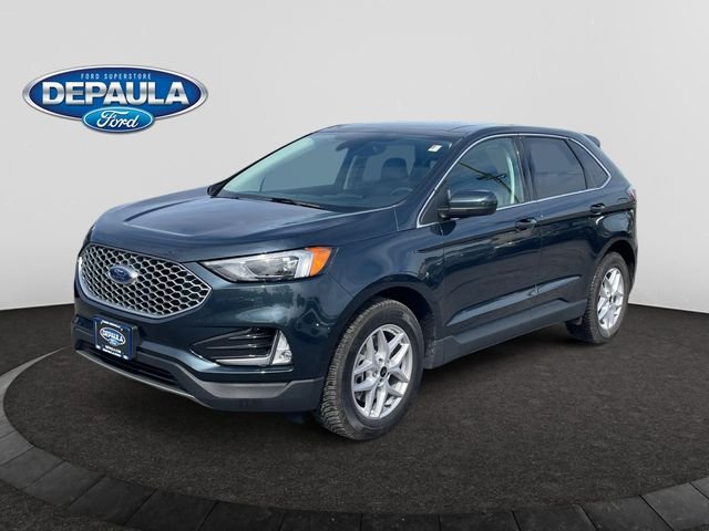 Used 2023 Blue Metallic Ford SEL image 1