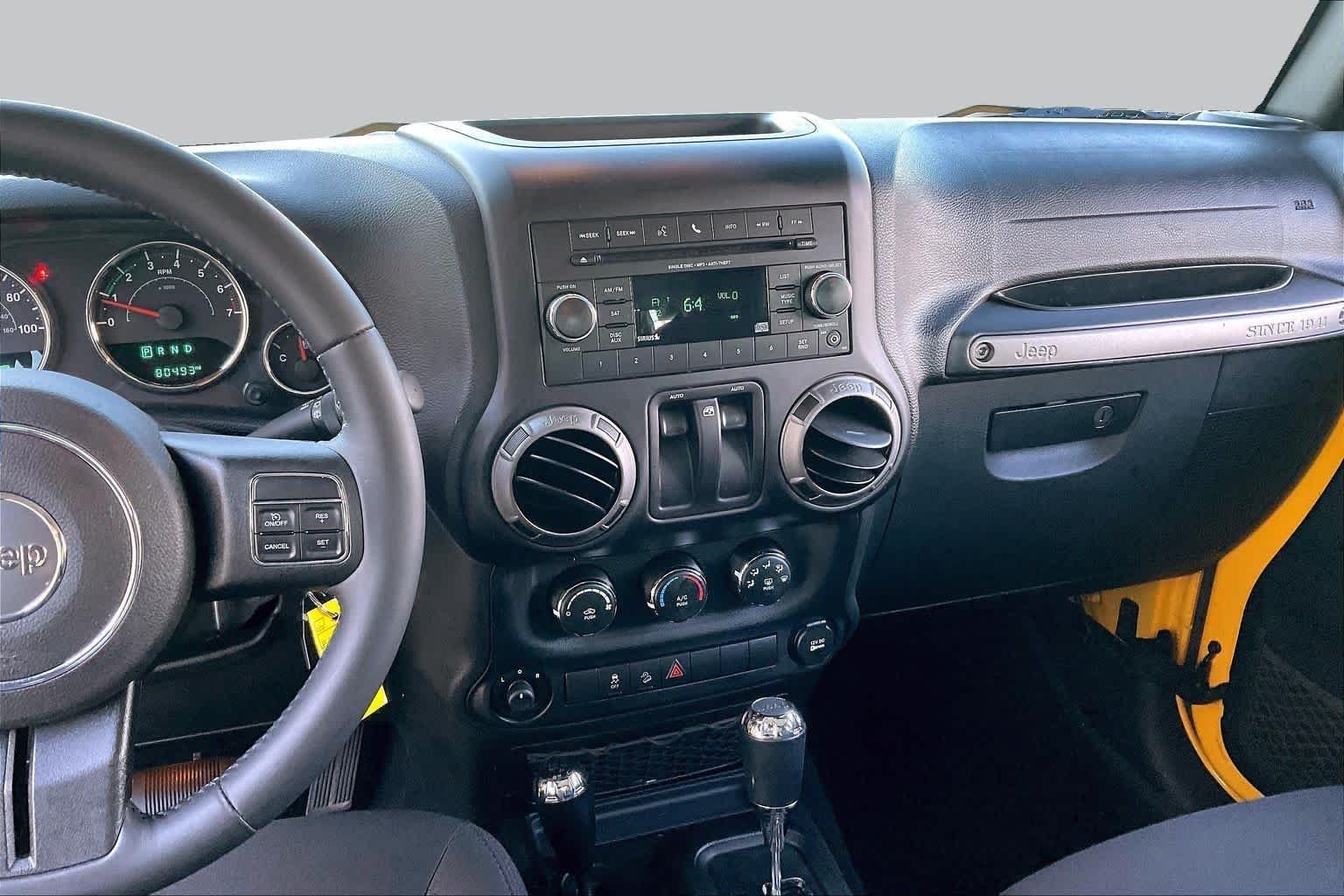 Used 2015 Baja Yellow Clearcoat Jeep Sport image 7