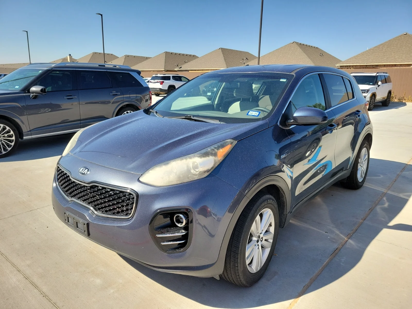 Used 2018 Pacific Blue Kia LX 4dr All-Wheel Drive image 1