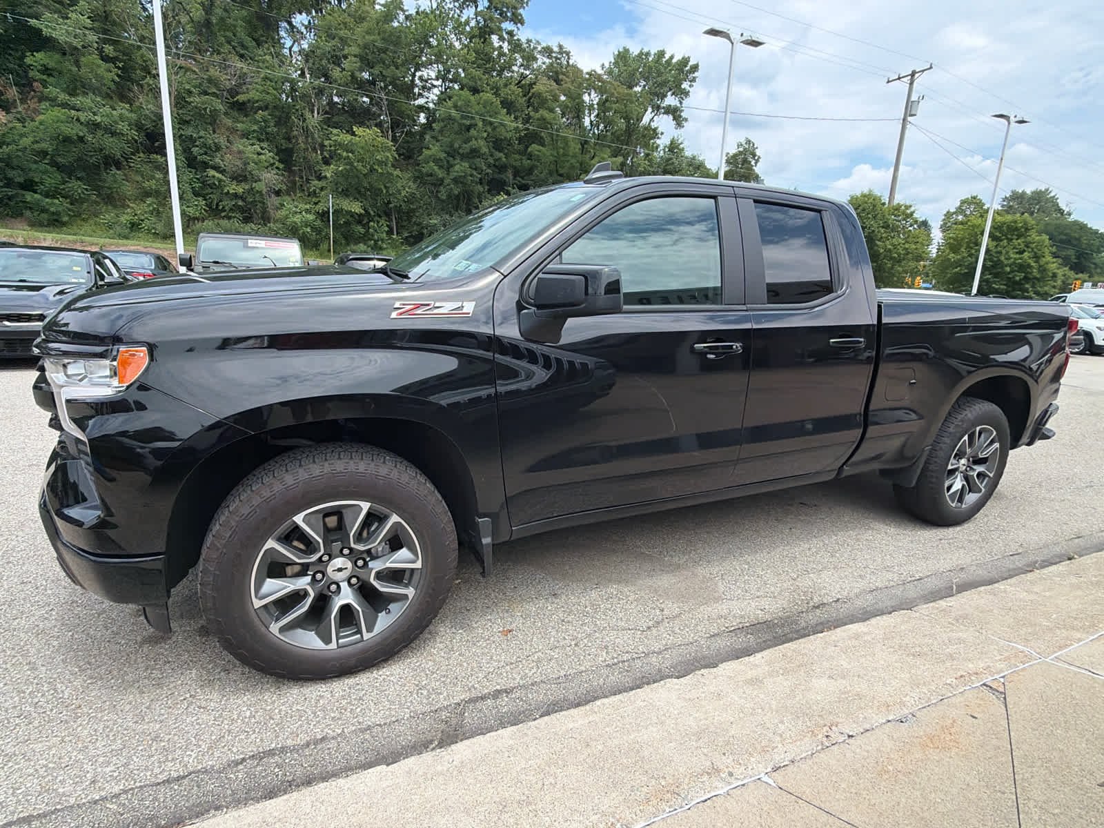 Certified Used 2024 Black Chevrolet RST image 3