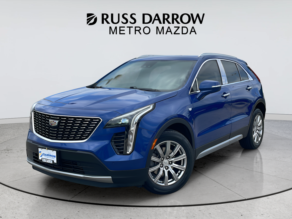 Used 2021 Blue Cadillac Premium Luxury image 1