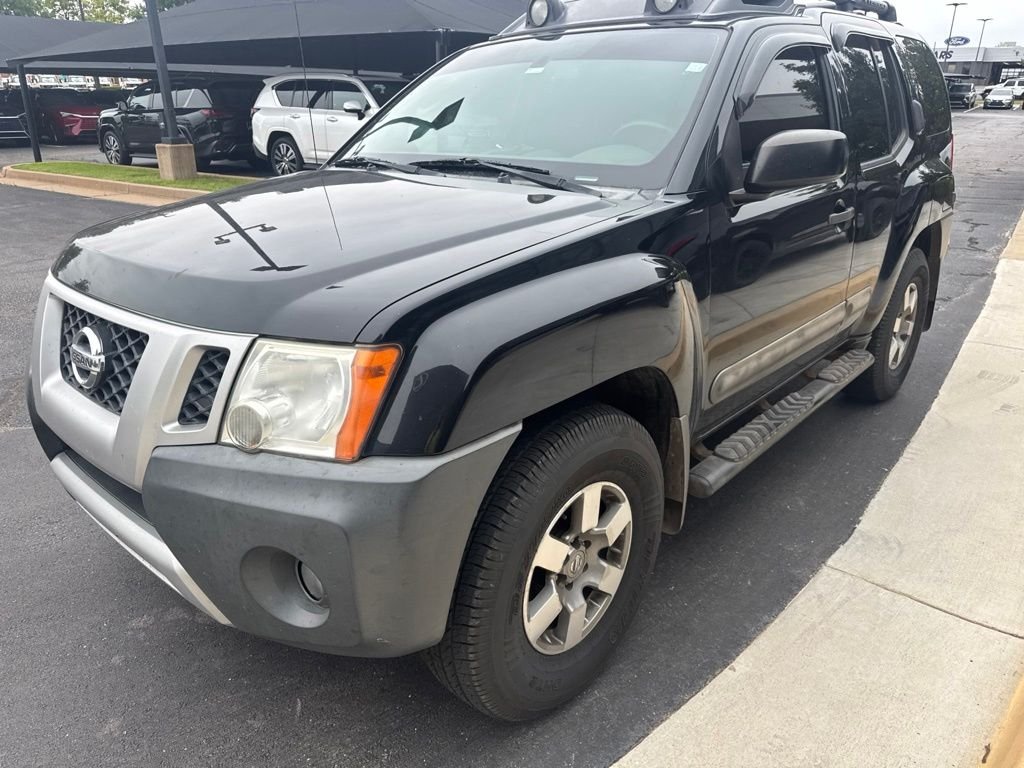 Used 2012 Black Nissan PRO-4X image 1