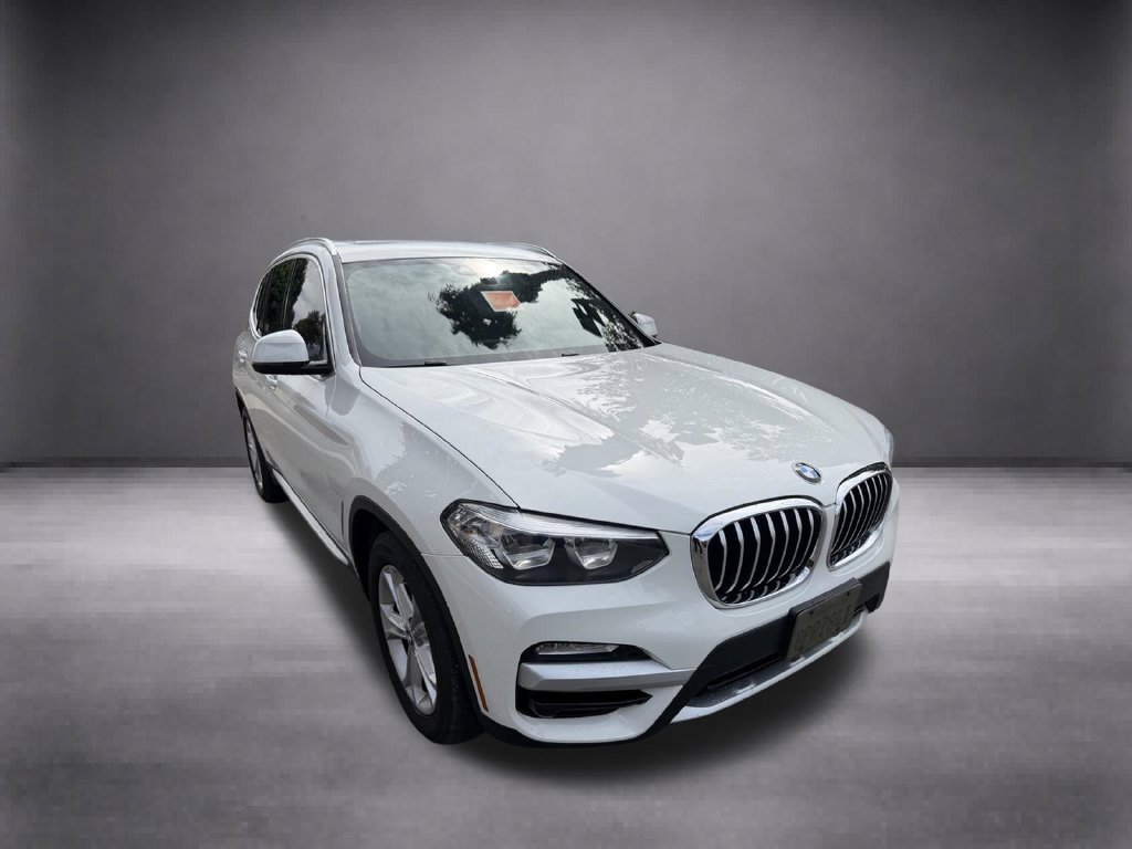 Used 2019 White BMW sDrive30i image 1