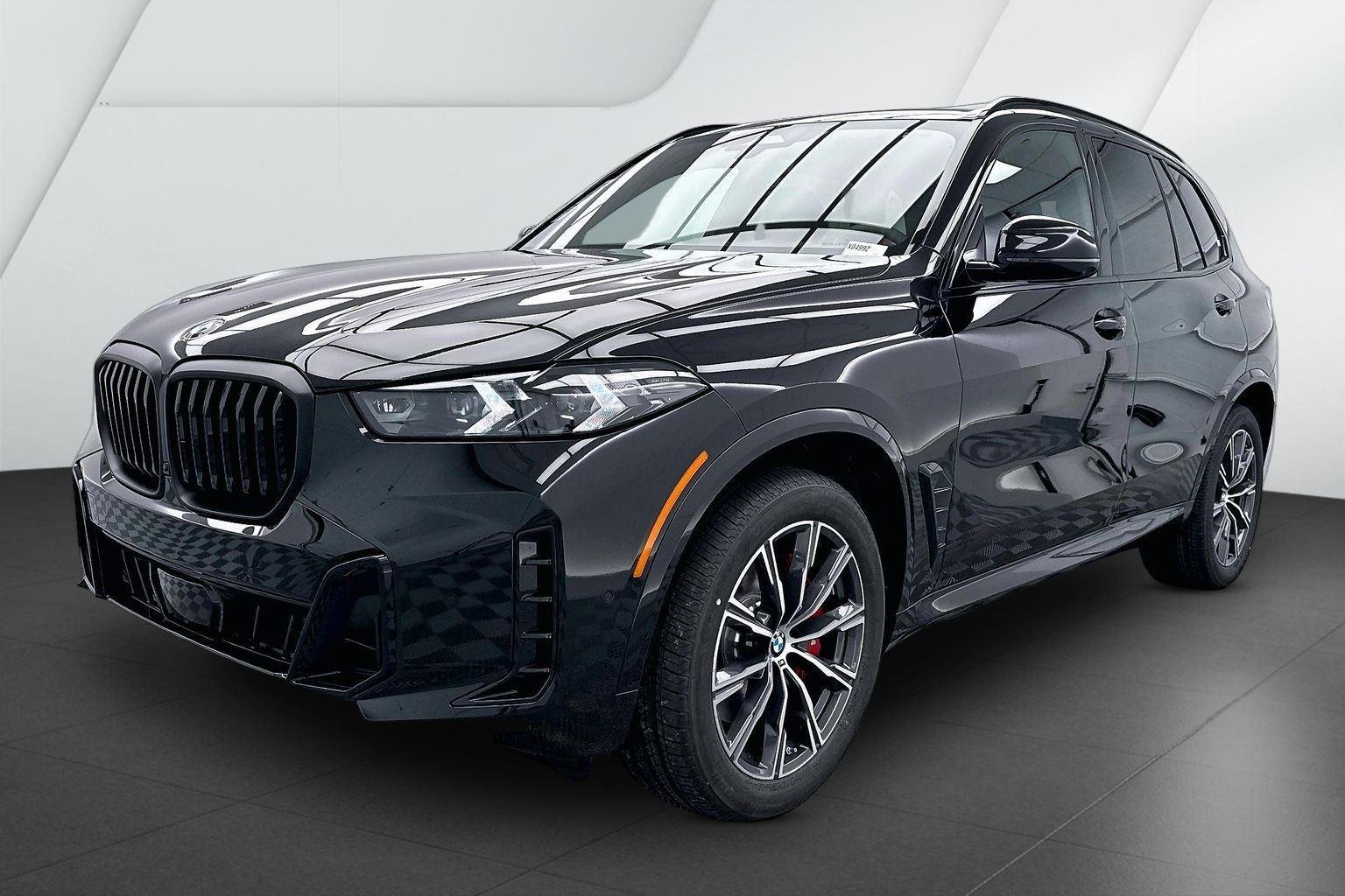 New 2026 Black Sapphire Metallic BMW xDrive40i image 3