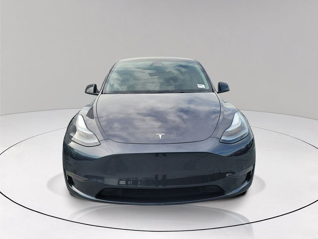 Used 2024 Tesla Model Y Long Range with VIN 7SAYGDED7RF153445 for sale in Coral Gables, FL