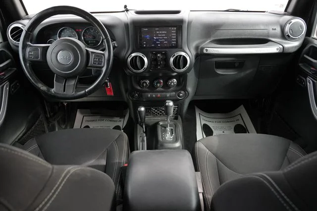 Used 2018 Black Jeep Unlimited Sahara image 17