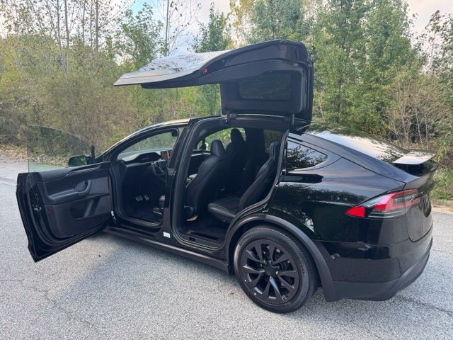 Used 2022 Solid Black Tesla Base image 11