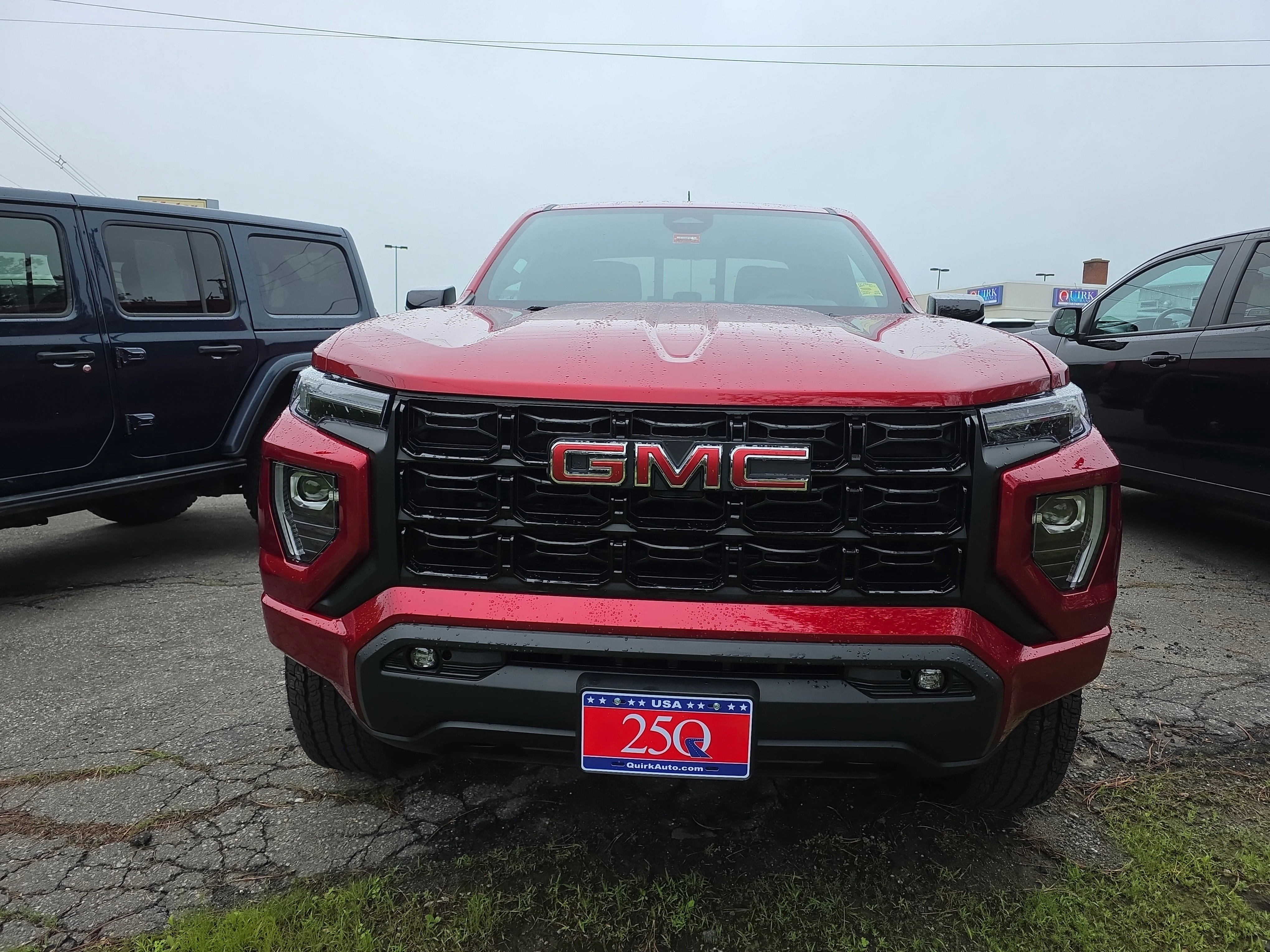 Used 2024 Volcanic Red Tintcoat GMC 4WD Elevation image 6