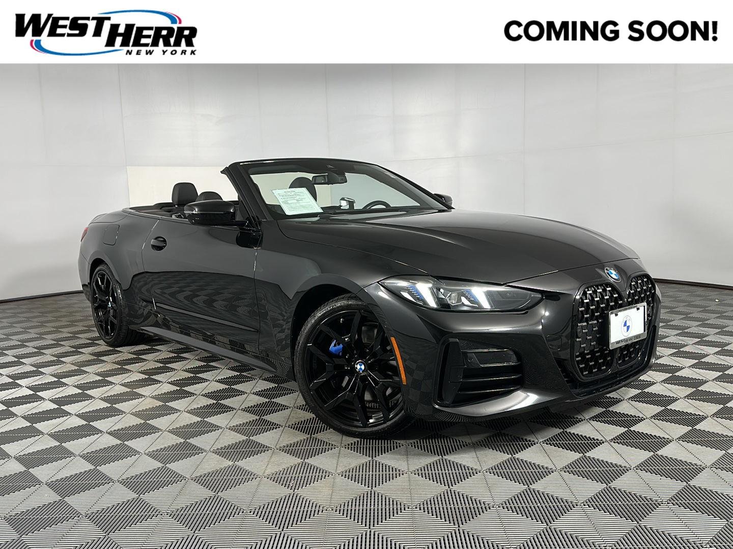 Used 2025 Black Sapphire Metallic BMW 430i xDrive image 1