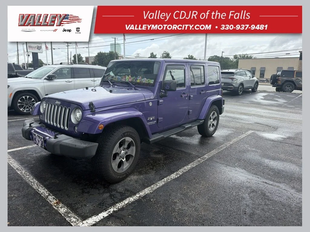 Used 2017 Purple Jeep Unlimited Sahara image 1