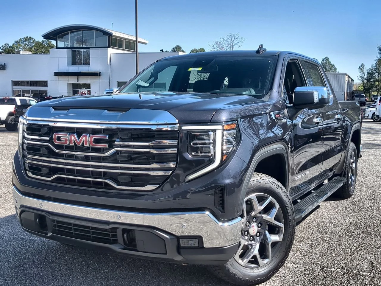 New 2026 TITANIUM RUSH METALLIC GMC SLT image 1