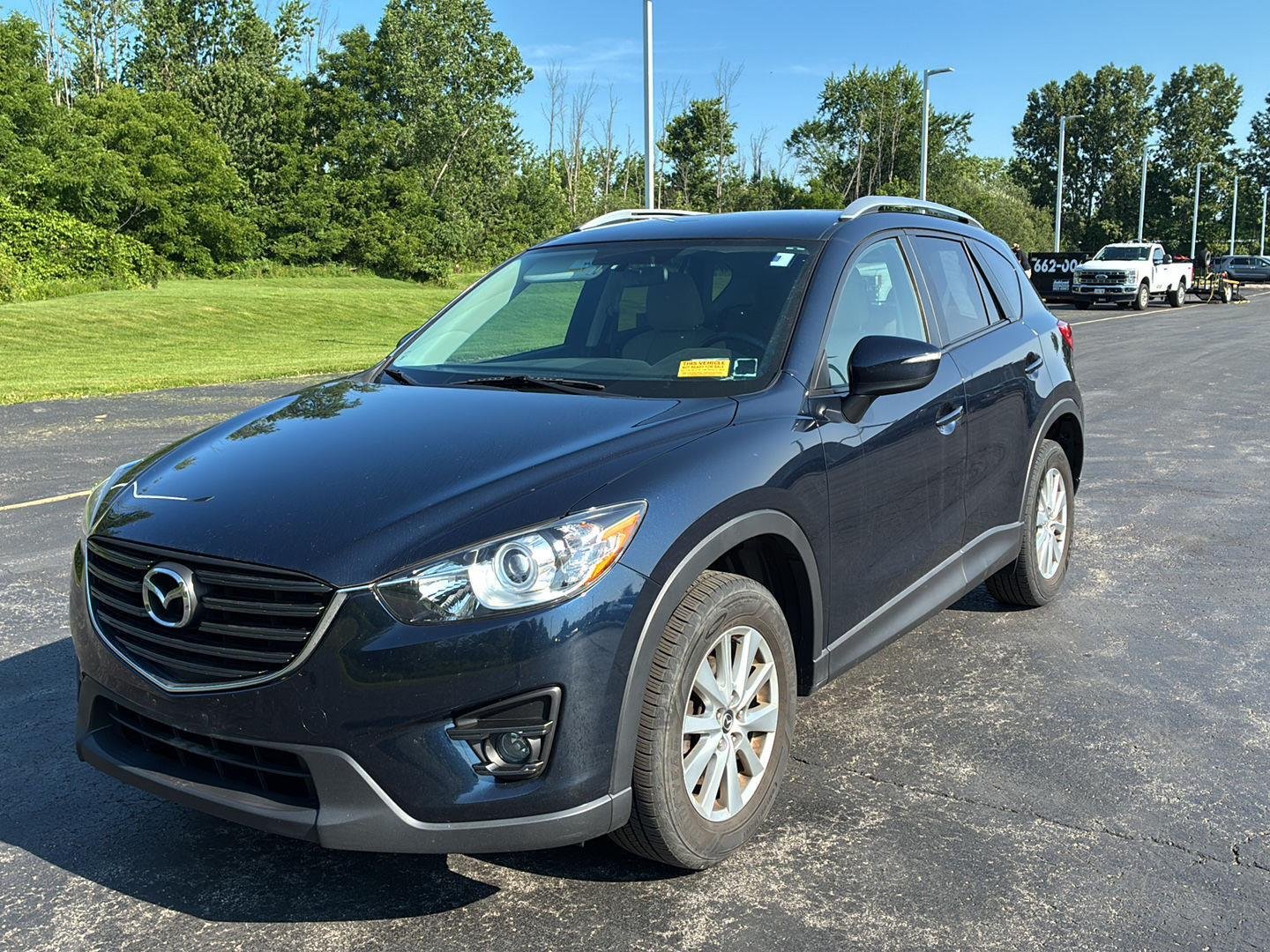 Used 2016 Deep Crystal Blue Mica Mazda Touring image 12