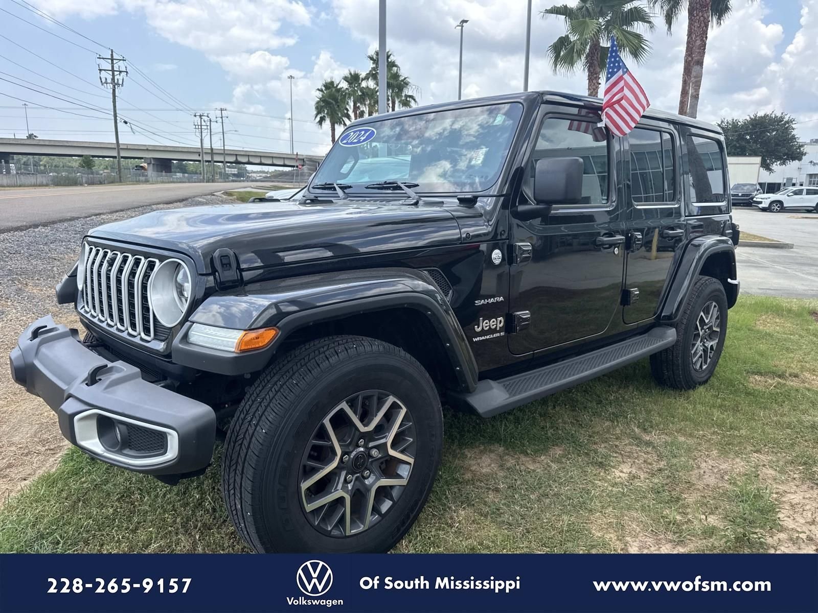 Used 2024 Black Jeep Sahara image 1