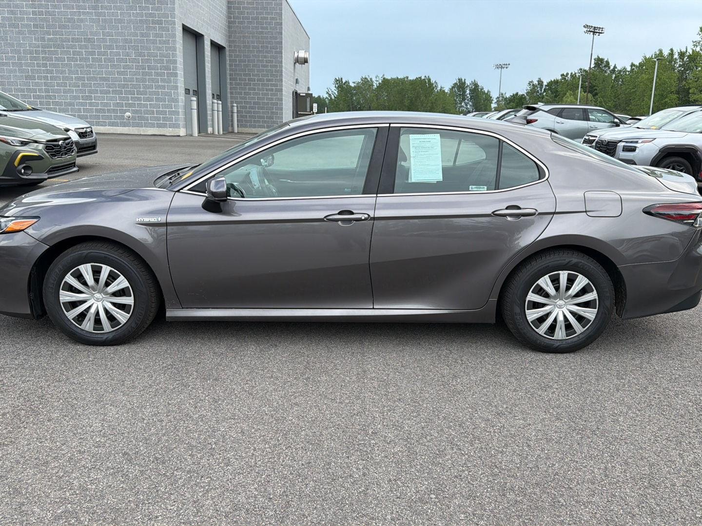 Used 2021 Predawn Gray Mica Toyota Hybrid LE image 3