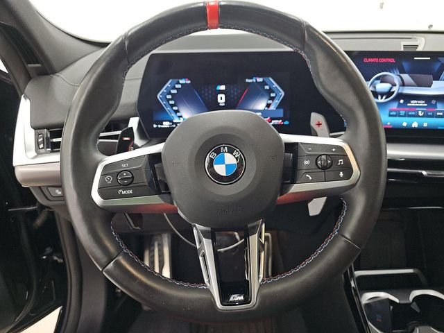 Used 2025 Black Sapphire Metallic BMW M35i image 3
