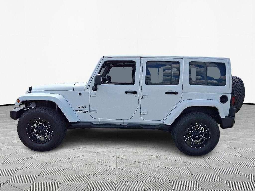 Used 2017 White Jeep Unlimited Sahara image 4