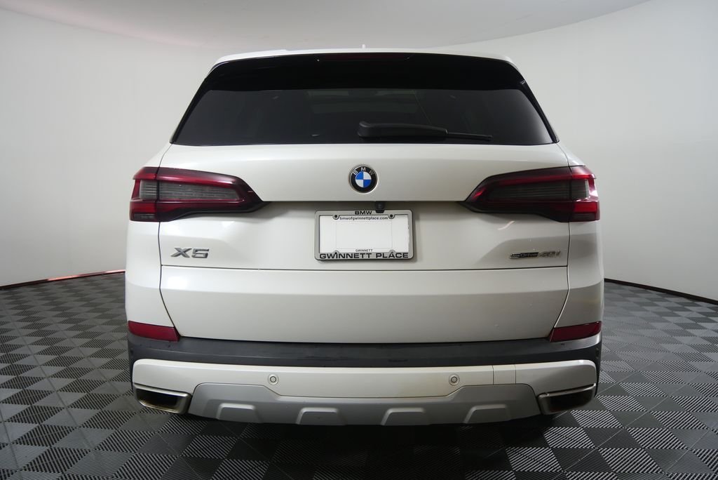 Used 2023 Mineral White Metallic BMW sDrive40i image 4