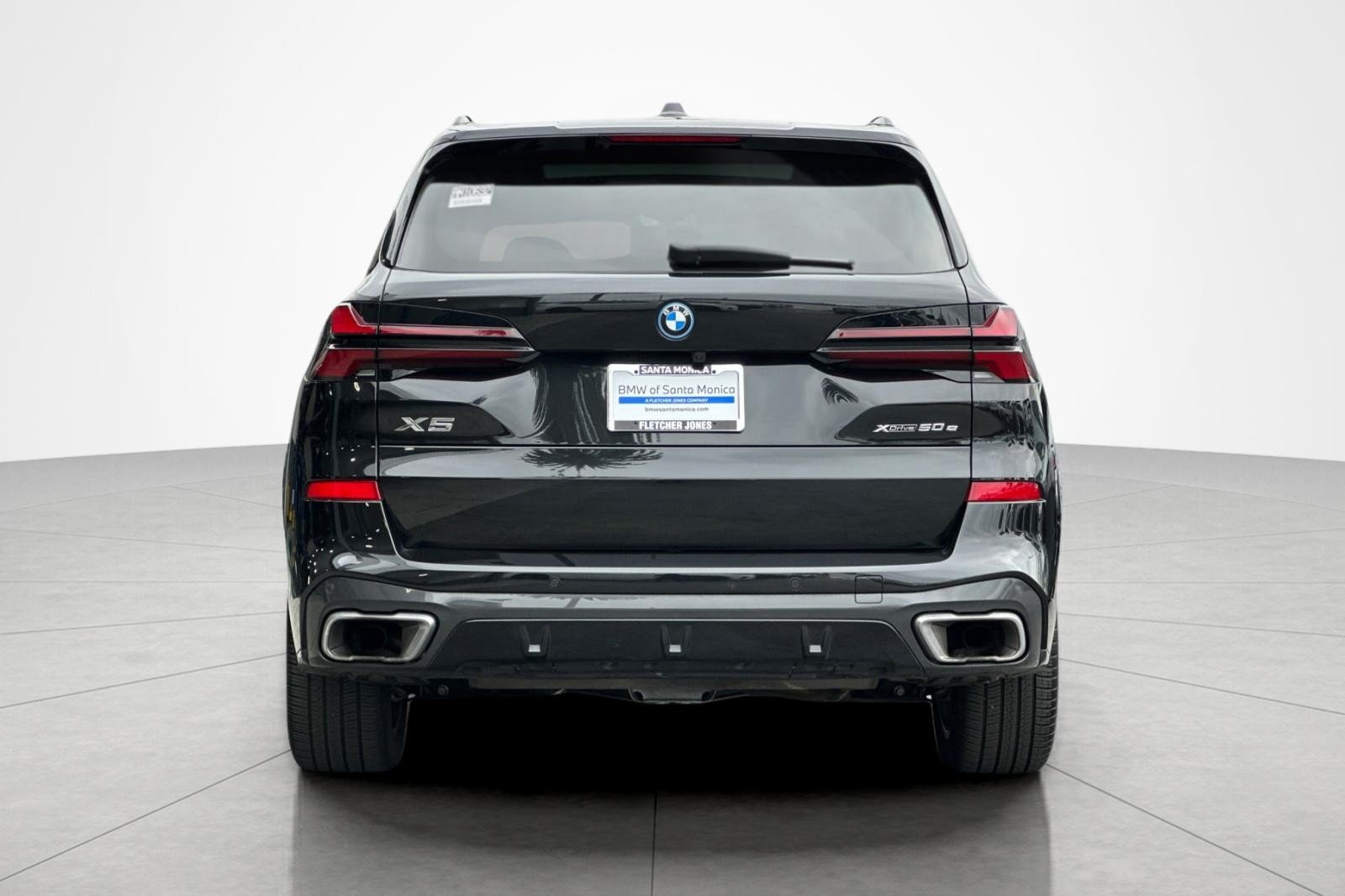 Used 2024 Black Sapphire Metallic BMW xDrive50e image 4