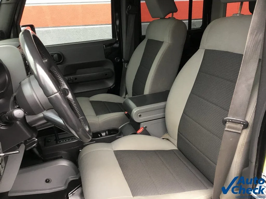 Used 2010 Black Jeep Unlimited Sport image 16