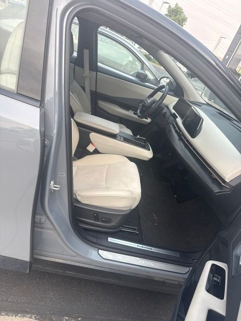 Used 2024 Gray Nissan EVOLVE+ e-4ORCE image 4