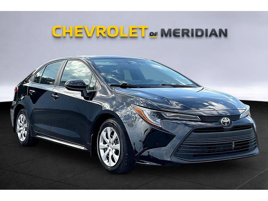 Used 2025 Black Toyota LE image 1