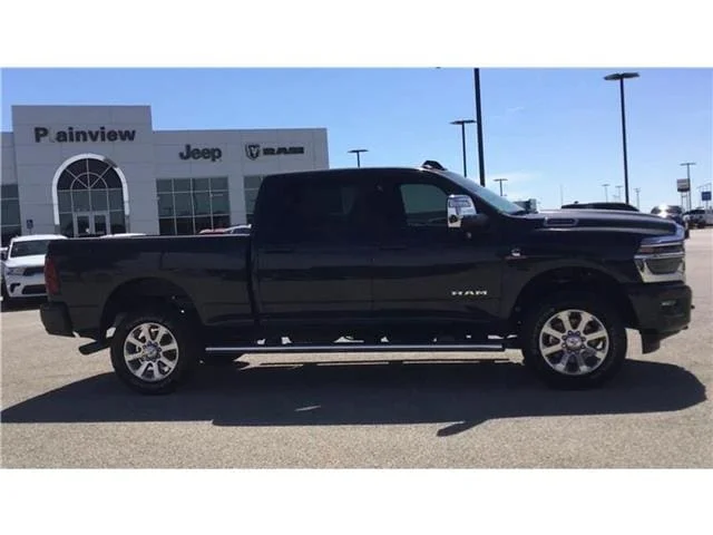 New 2026 Forged Blue Metallic  Paint Ram LARAMIE CREW CAB 4X4 6
