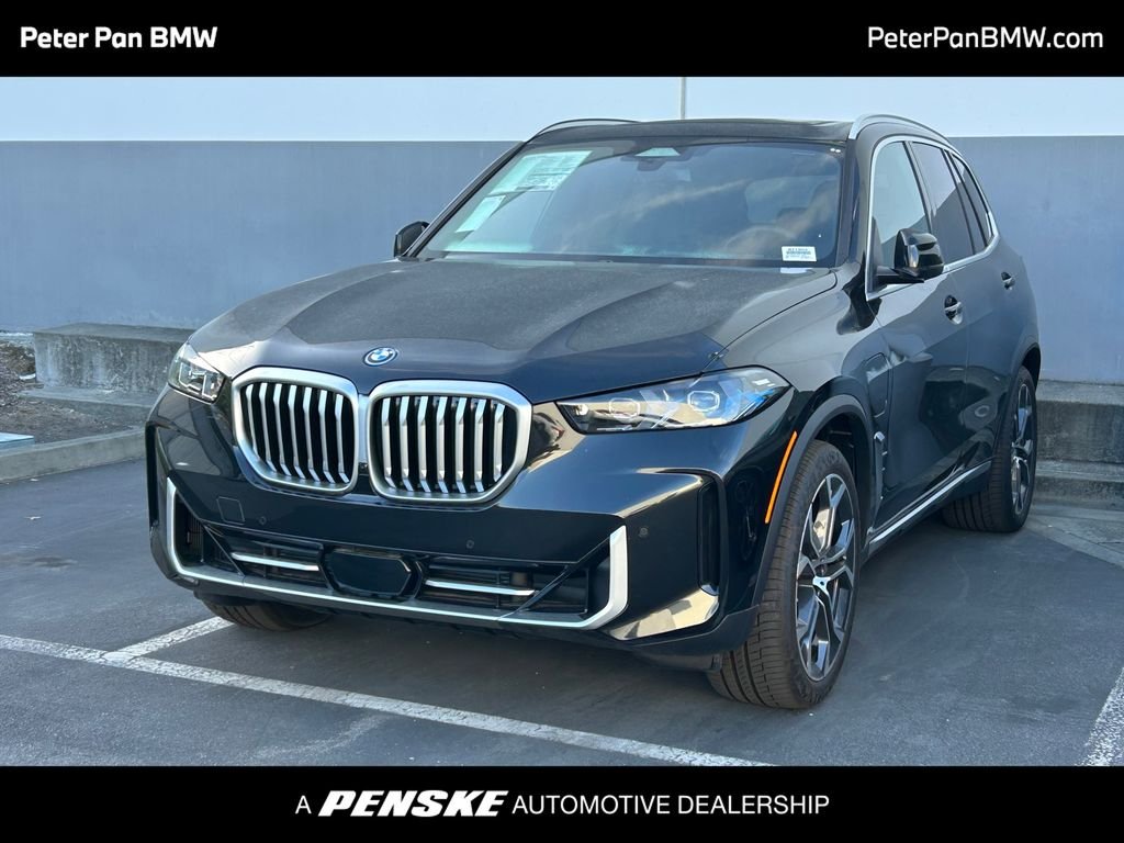 New 2026 Black Sapphire Metallic BMW xDrive50e image 1