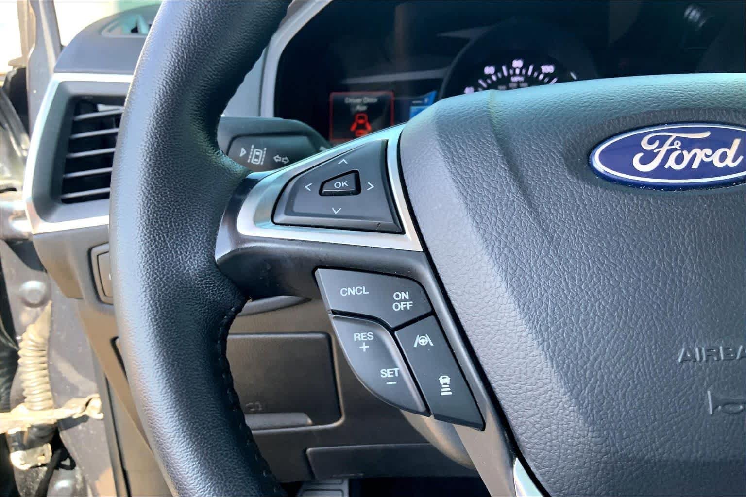 Certified Used 2024 Stone Blue Metallic Ford Titanium image 24