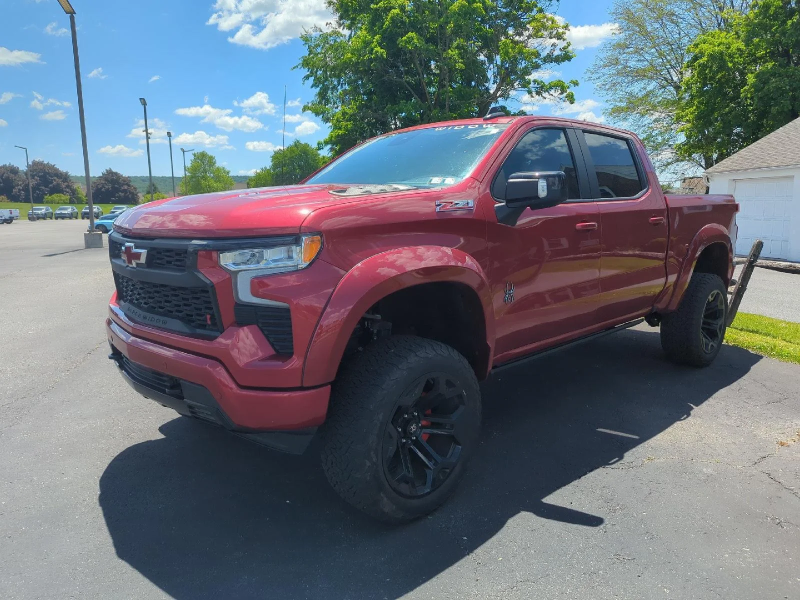 Used 2024 Radiant Red Tintcoat Chevrolet RST image 2