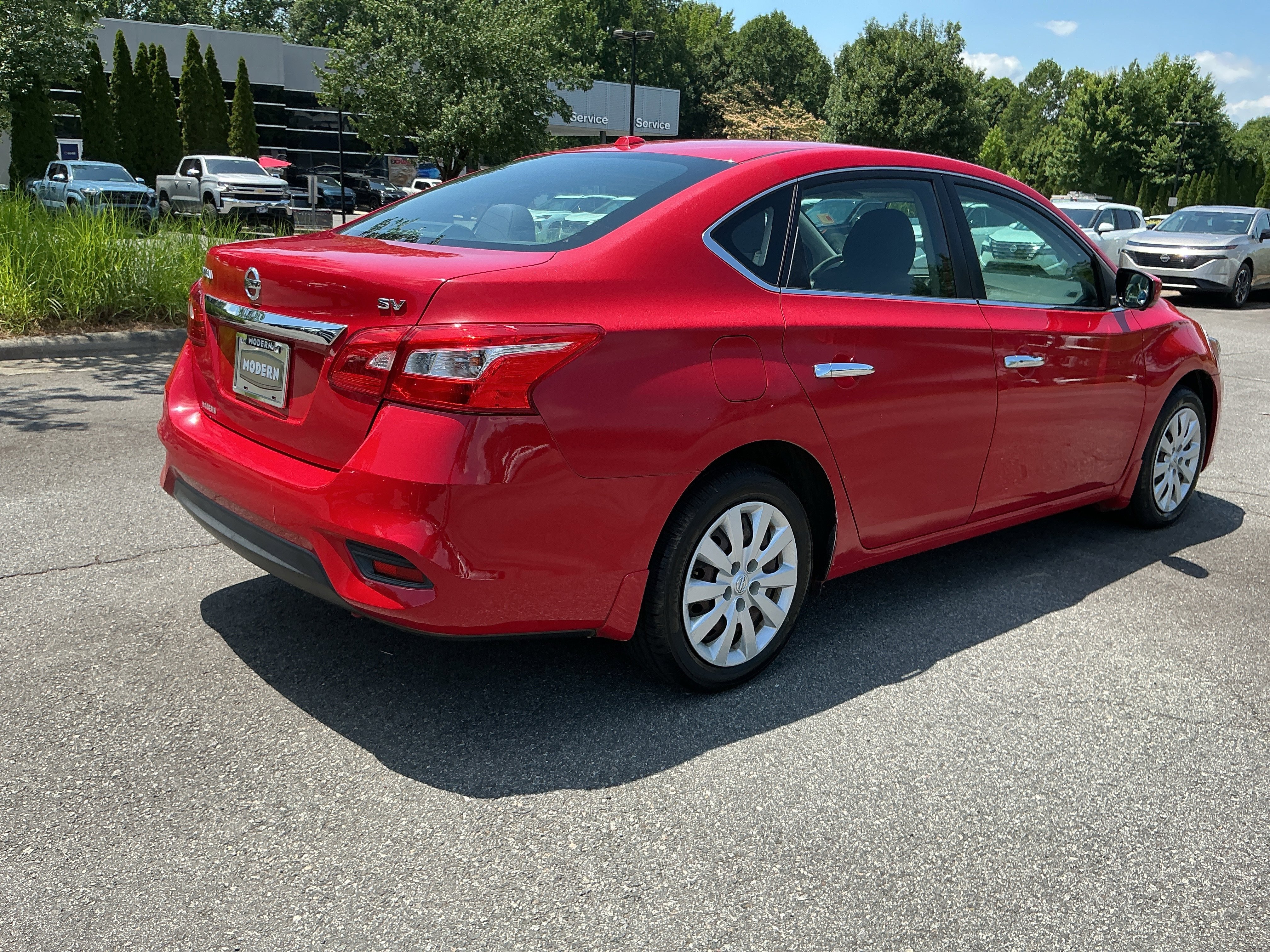 Used 2017 Red Alert Nissan SV image 4