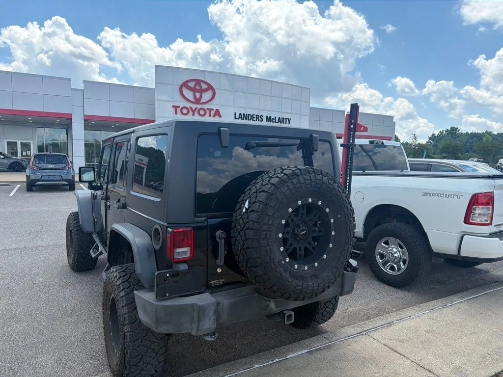 Used 2015 Black Jeep Unlimited Sport image 7