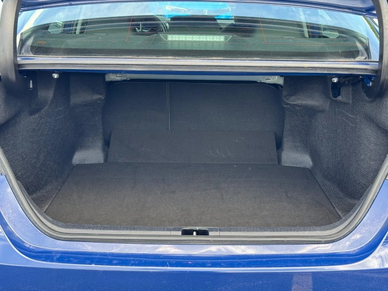 Used 2024 Reservoir Blue Toyota LE image 5