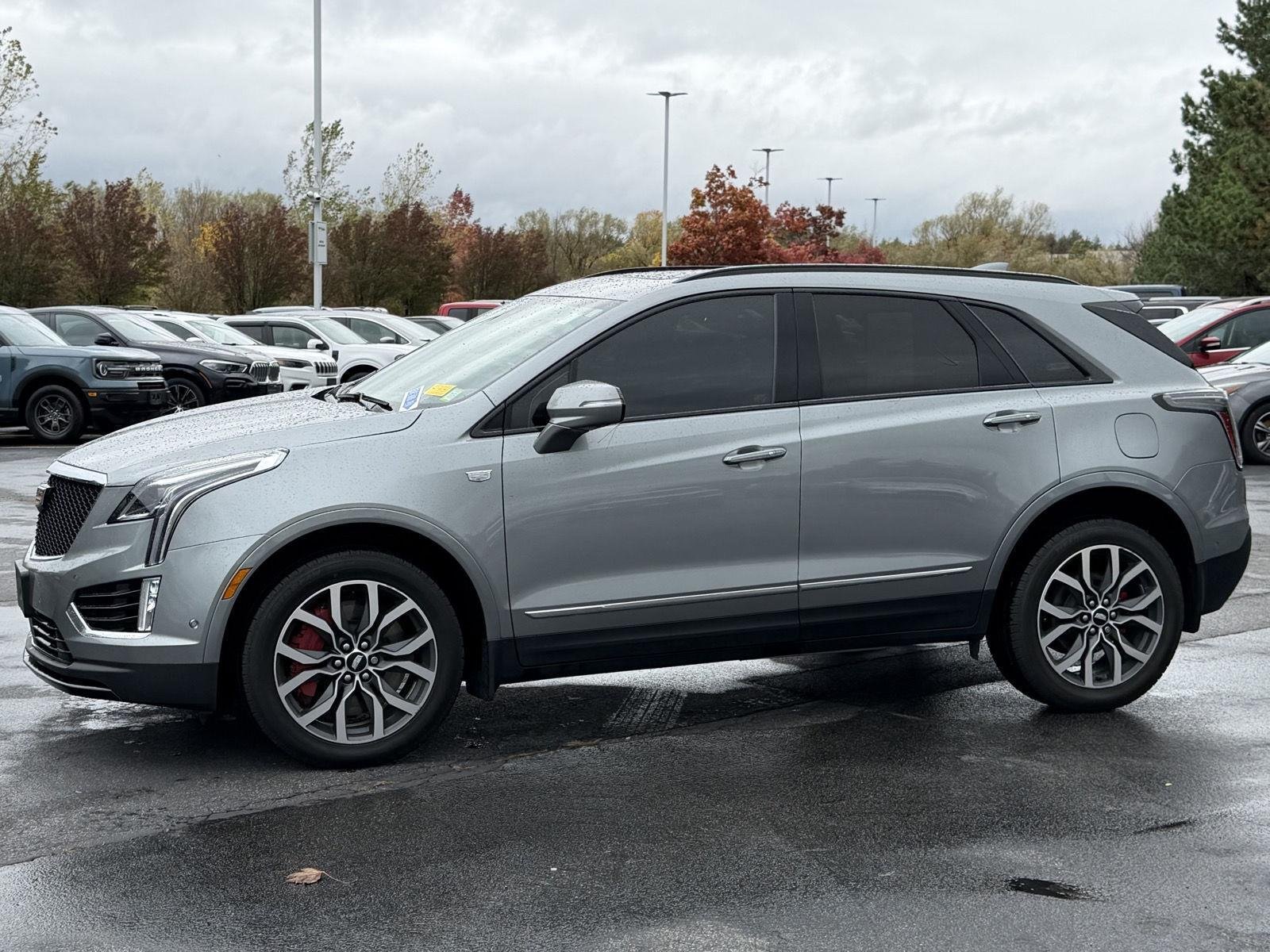 Used 2024 Argent Silver Metallic Cadillac AWD Sport image 4