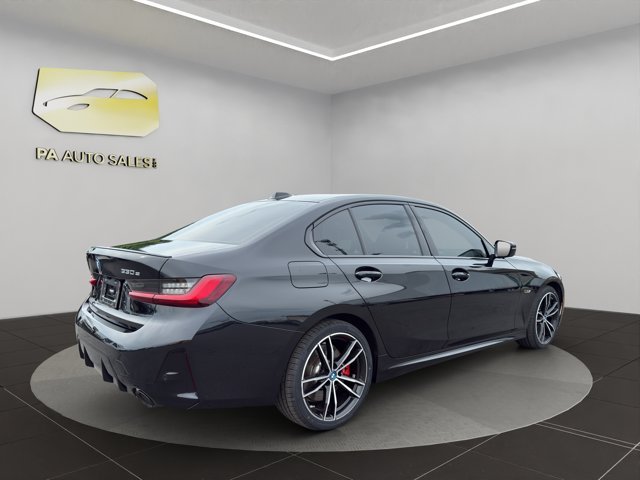 Used 2023 Black Sapphire Metallic BMW 330e xDrive image 7