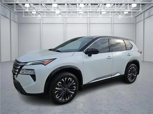 Used 2024 Everest White Pearl Nissan Platinum image 1