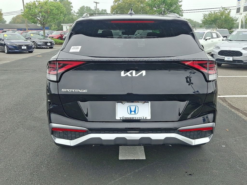 Used 2023 Ebony Black Kia SX-Prestige image 5