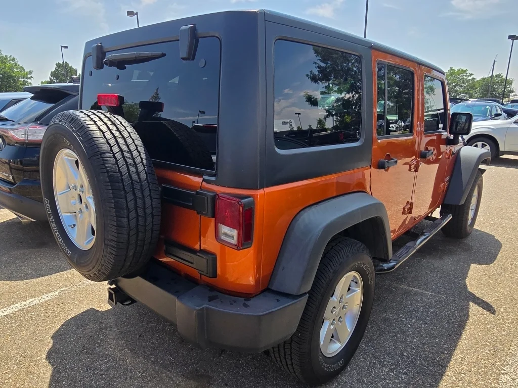 Used 2011 Mango Tango Pearlcoat Jeep Sport image 15