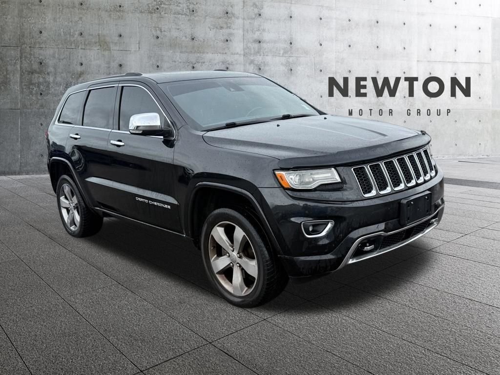 Used 2014 Black Jeep Overland image 1