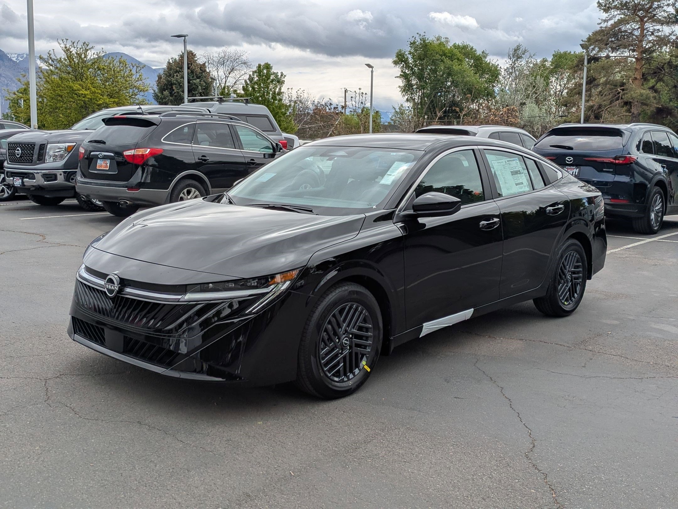 New 2026 Super Black Nissan SV image 8