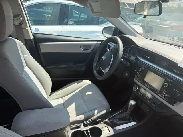 Used 2016 Super White Toyota LE image 13